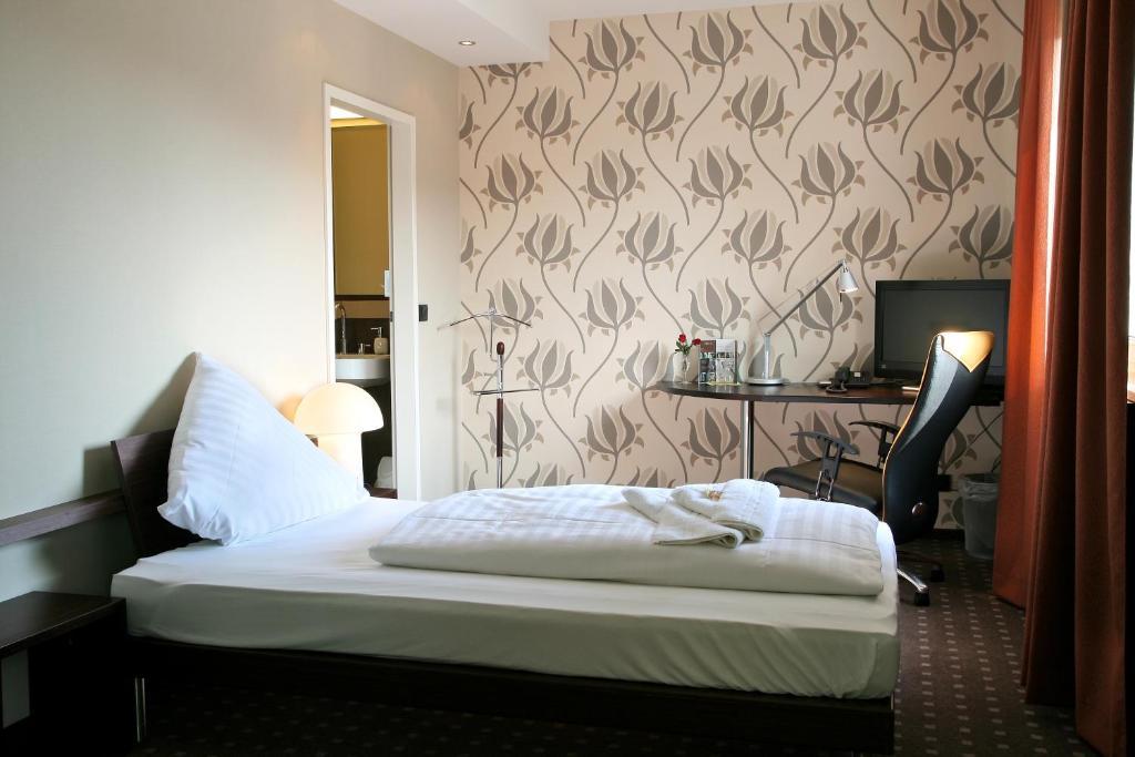 L'Escala Hotell Dreieich Rum bild